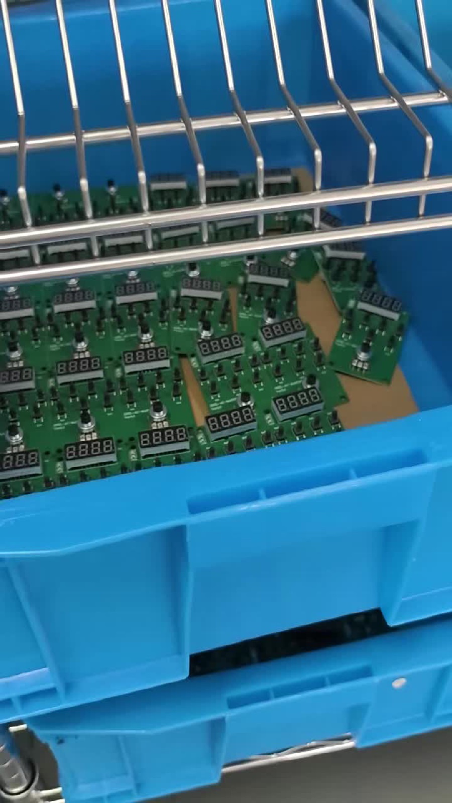 In-house BLDC motor controller PCBs in production rack